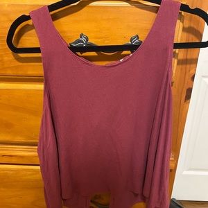 maroon tank top with tied back.